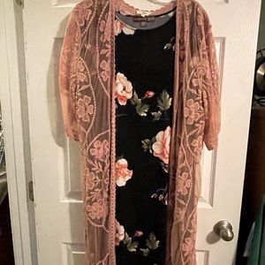Black Dress with Pink Floral Print Paired with a Light Pink Lace Jacket